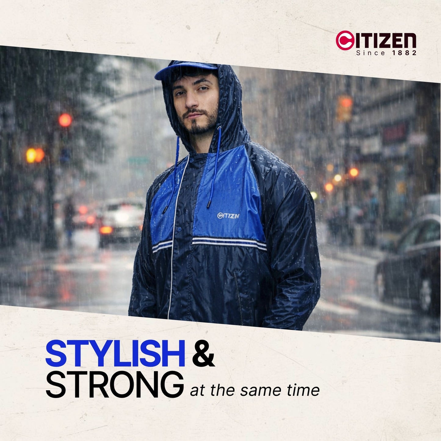 A man wearing a blue and navy Citizen windbreaker jacket stands in the rain on a city street, with the Citizen logo in the top right and the text 'STYLISH & STRONG at the same time' on a cream banner at the bottom.